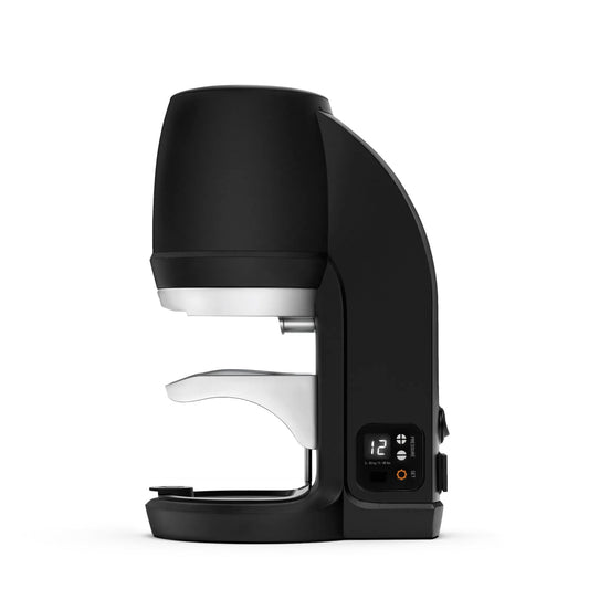 Black Puqpress Q sixth generation automatic precision coffee tamper from the side