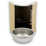 La Marzocco Filter X Basket in front with cardboard packaging