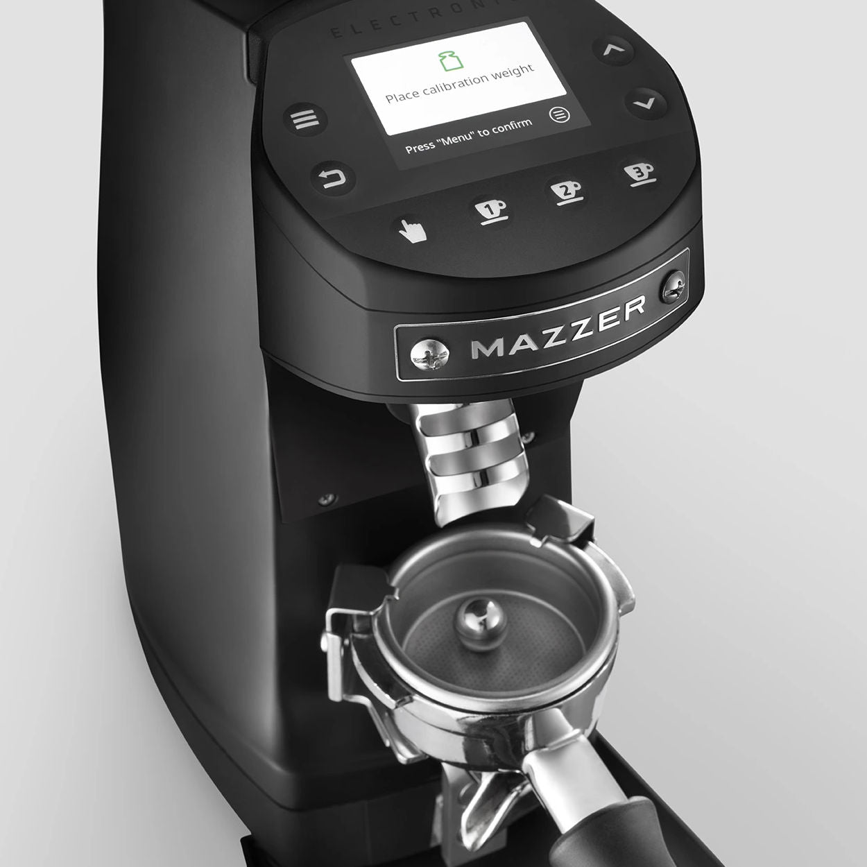 Black Mazzer Mini Grind by Weight espresso grinder with calibration weight inside portafilter
