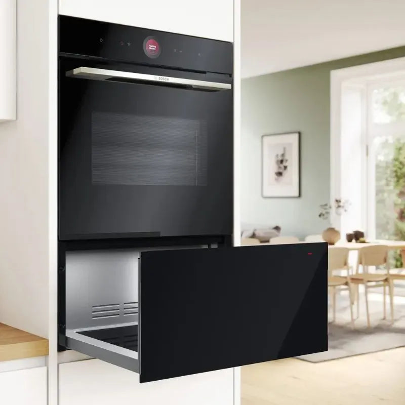 https://www.tafelberg.co.za/stores/za.co.storefront7.tafelberg/products/bid7101b1b/pictures/bosch-29cm-series-8-warmer-drawer-bid7101b1b-lifestyle_tlul.jpg