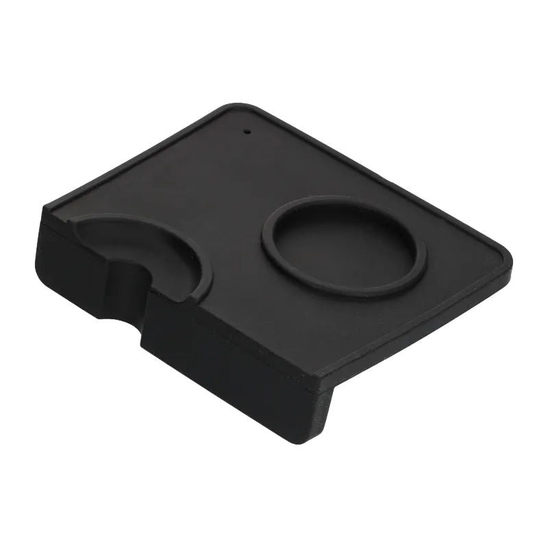 Black Silicone Corner Tamping Mat With Holder for espresso angled view