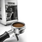 Espresso portafilter in front of Mazzer T-Tamper electronic espresso tamper
