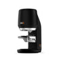Black Puqpress Mini automatic coffee tamper angled view