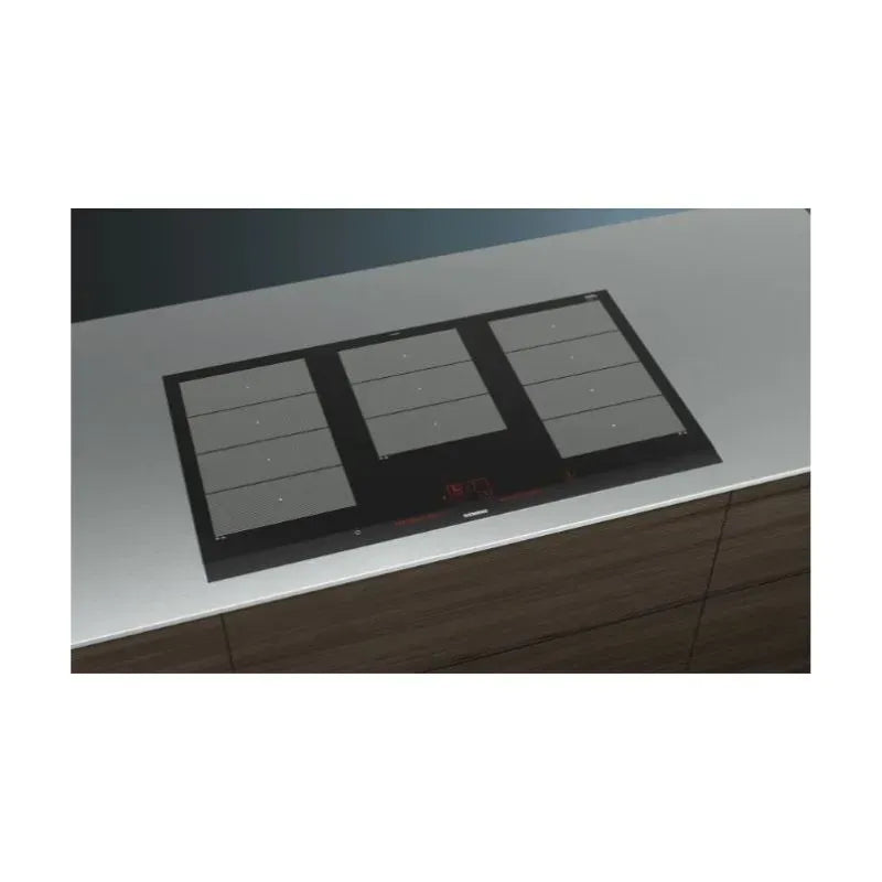 https://www.tafelberg.co.za/stores/za.co.storefront7.tafelberg/products/ex975lxc1e/pictures/siemens-90cm-induction-hob-ex975lxc1e-02_j563.jpg