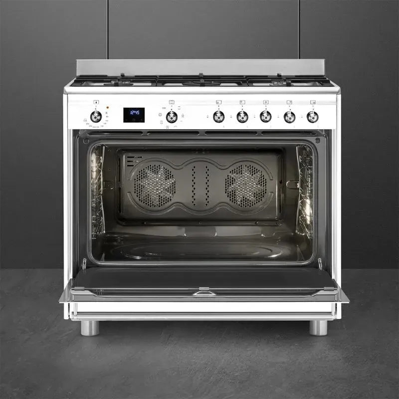 https://www.tafelberg.co.za/stores/za.co.storefront7.tafelberg/products/ssa91mawh2/pictures/smeg-90cm-glossy-white-gas-electric-cooker-ssa91mawh2-open-empty_r3rh.jpg