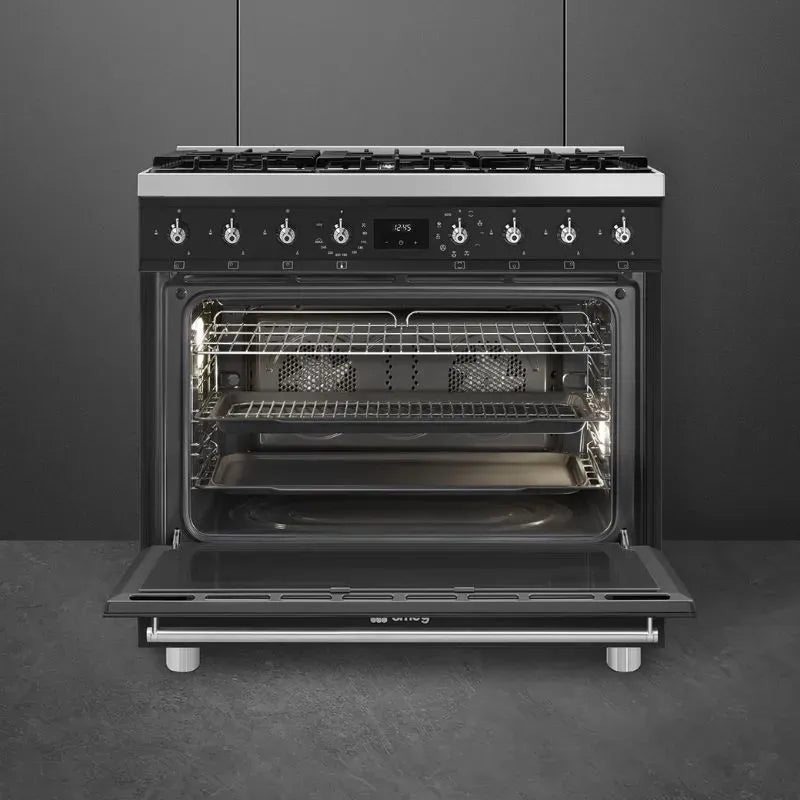 https://www.tafelberg.co.za/stores/za.co.storefront7.tafelberg/products/c9mambssa2/pictures/smeg-90cm-matt-black-gas-electric-cooker-c9mambssa2-open_9md.jpg