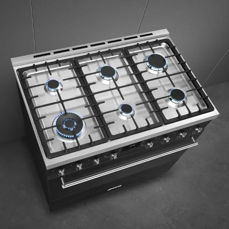 https://www.tafelberg.co.za/stores/za.co.storefront7.tafelberg/products/c9mambssa2/pictures/smeg-90cm-matt-black-gas-electric-cooker-c9mambssa2-top-view_cyhv.jpg