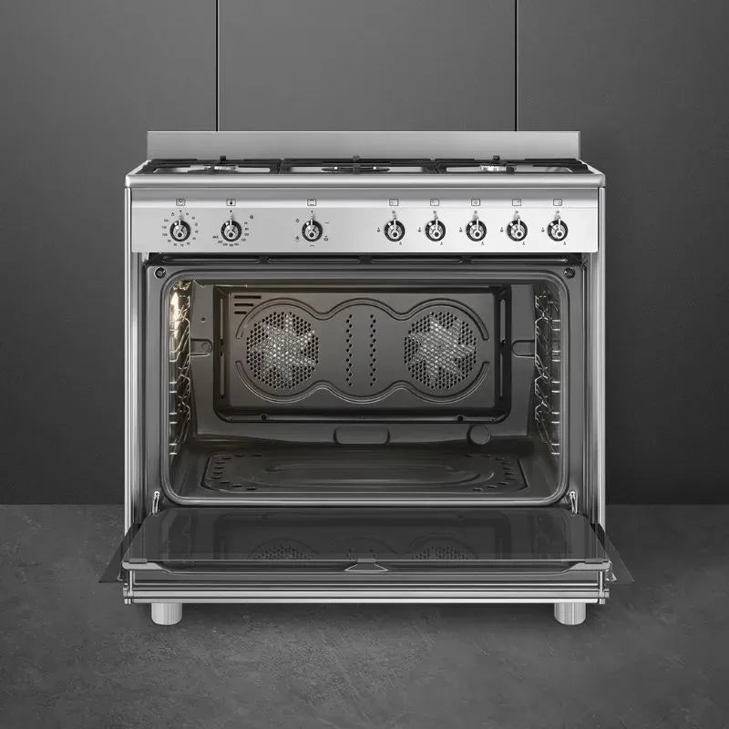https://www.tafelberg.co.za/stores/za.co.storefront7.tafelberg/products/ssa91ggx2/pictures/smeg-90cm-stainless-steel-classica-gas-cooker-ssa91ggx2-open-empty_esj0.jpg