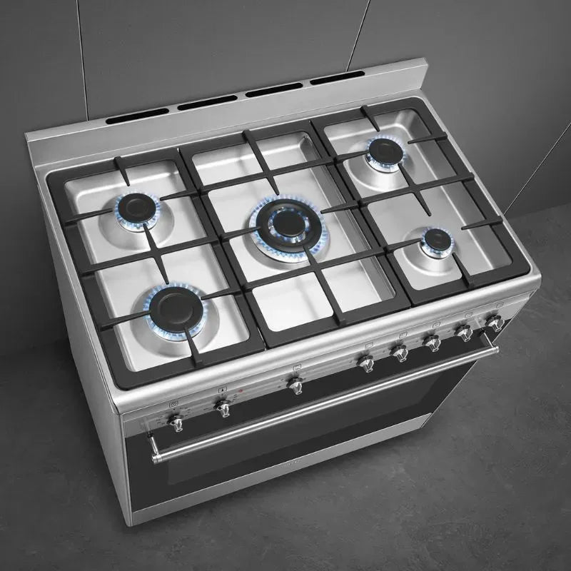 https://www.tafelberg.co.za/stores/za.co.storefront7.tafelberg/products/ssa91ggx2/pictures/smeg-90cm-stainless-steel-classica-gas-cooker-ssa91ggx2-top-view_73f6.jpg